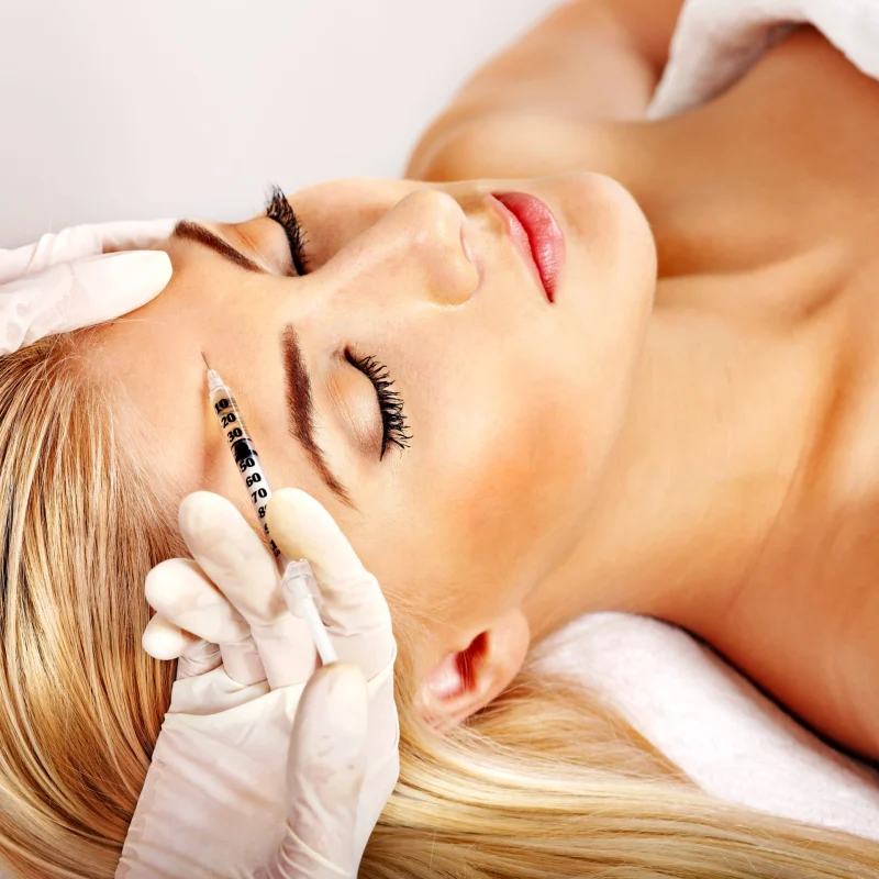 A Female receives a Botox injection on her forehead at Gemini Glow Medspa in Taylorsville, UT