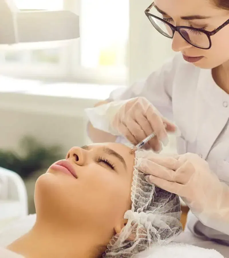 A woman receives her Sculptra injection at Glow Medspa in Taylorsville, UT